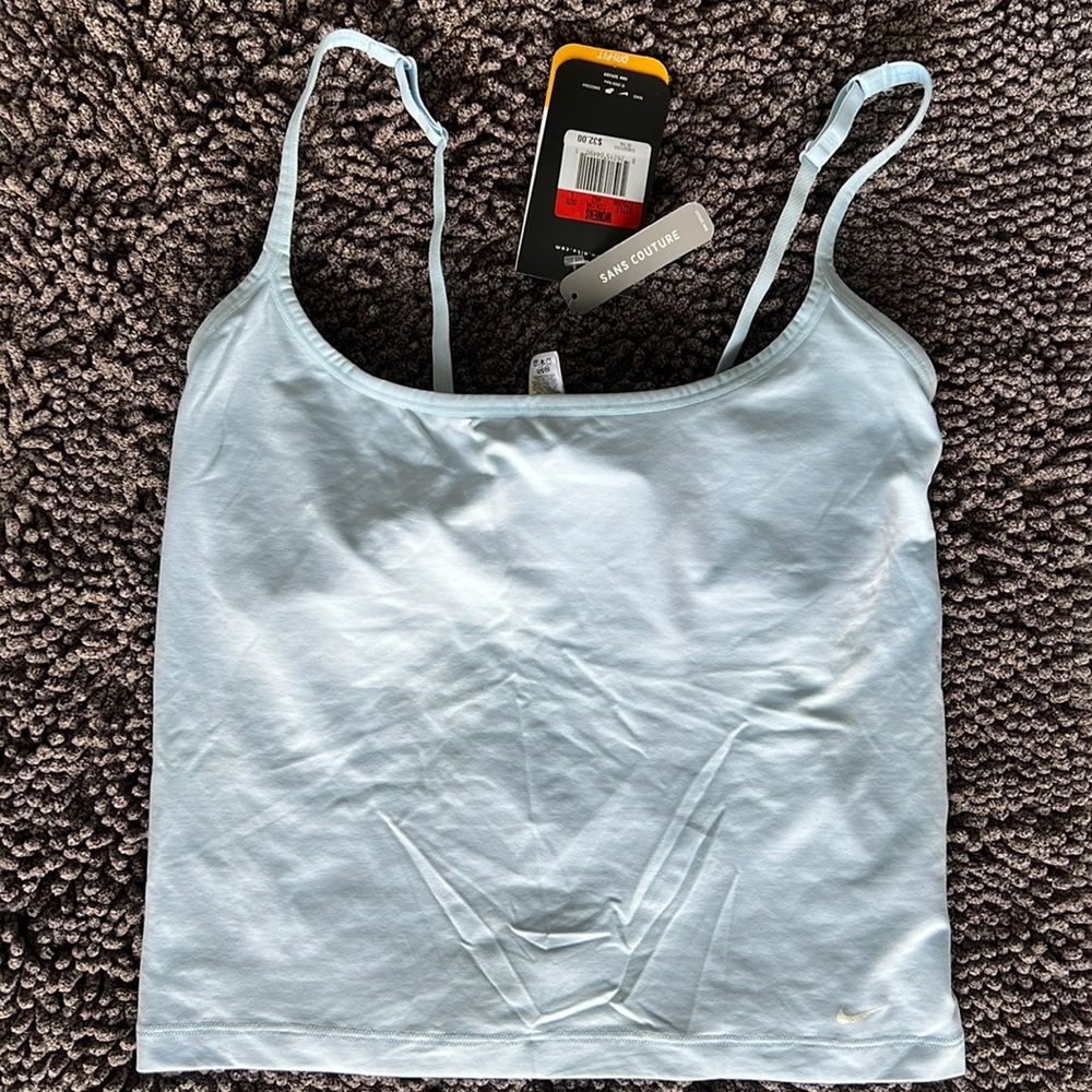 Nike Women’s Large Dri-Fit Athletic Light Blue Top with built in bra liner.